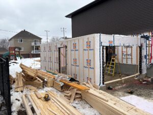 Ground-level extension at the back of a house under construction