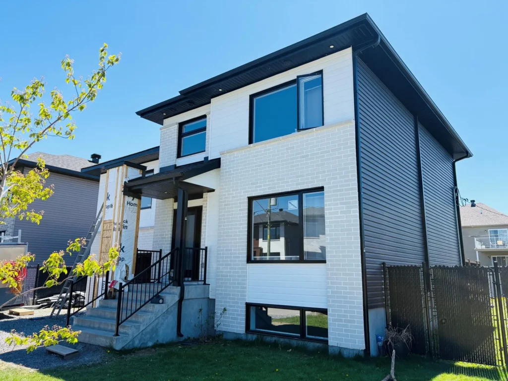 House with an addition by Construction HERA on Montreal’s North Shore, after the work